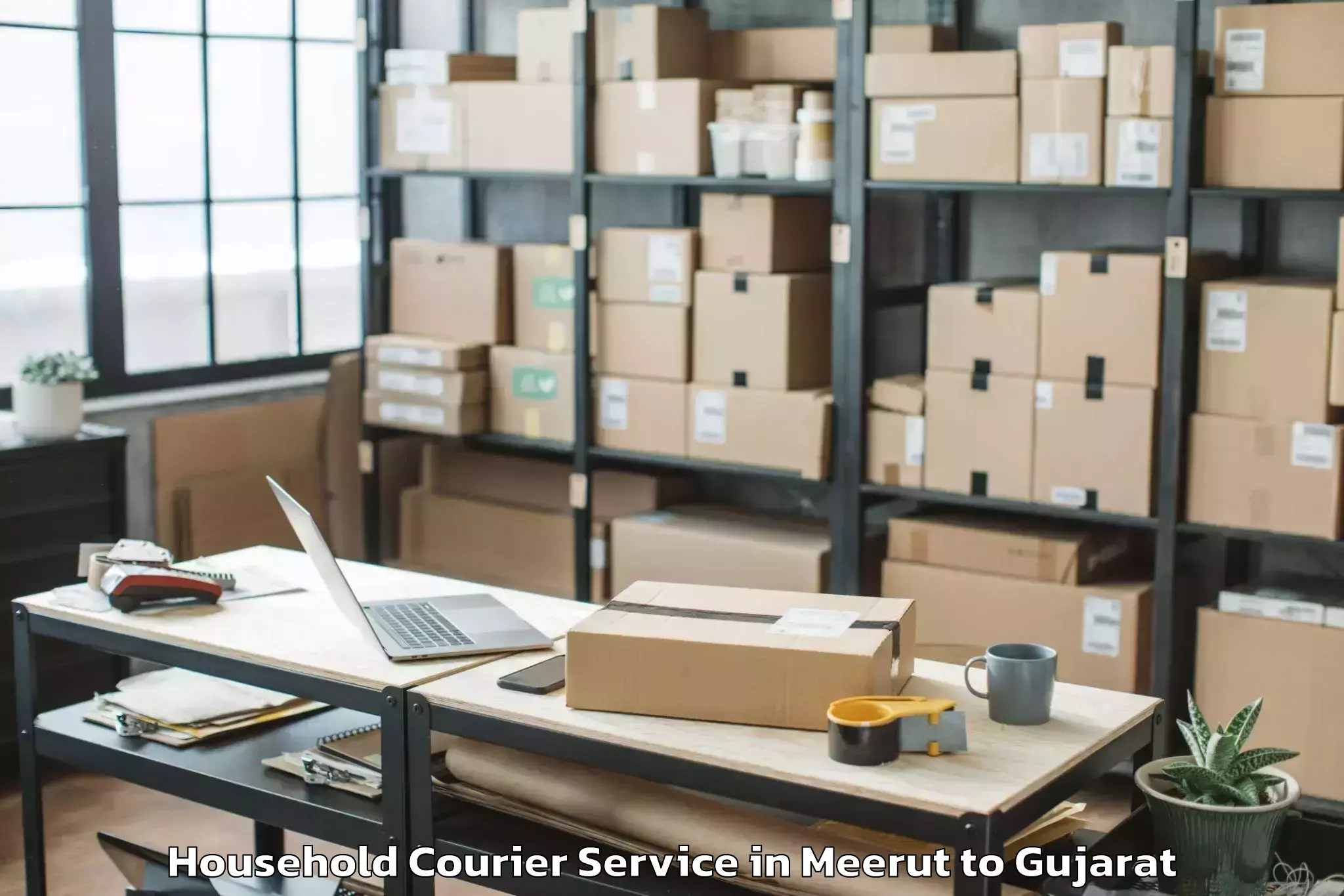 Affordable Meerut to Kodinar Household Courier